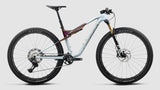 Bicicletas MTB XC Orbea Oiz M10 2027 Frozen Concrete/Sunset Carbon View Matt